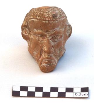 Head of a figurine depicting a Nubian (p06X-1091).